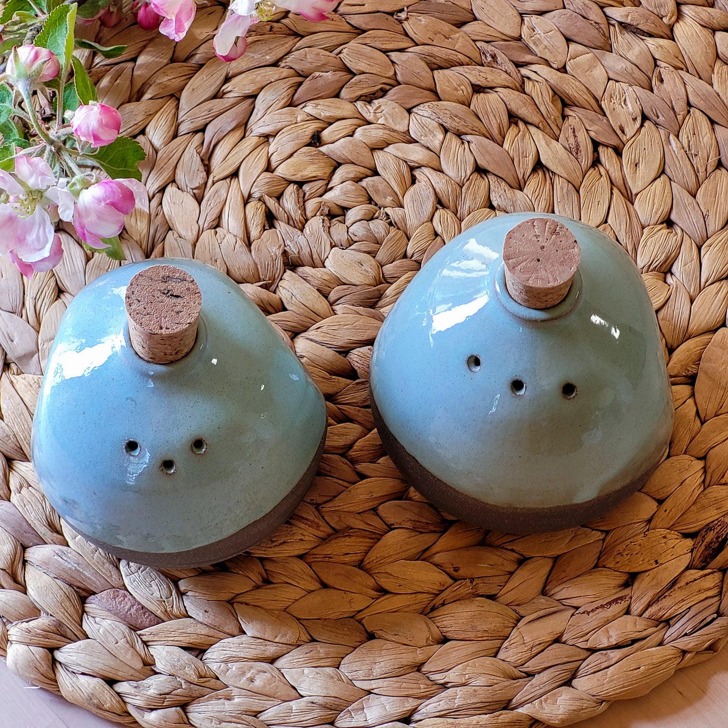 Take a daring step and add this handmade, turquoise and grey ceramic shaker to your table! With exquisitely decorative pottery from Jogita Art Studio, you are sure to set a bold and daring scene. Spice up your meals!