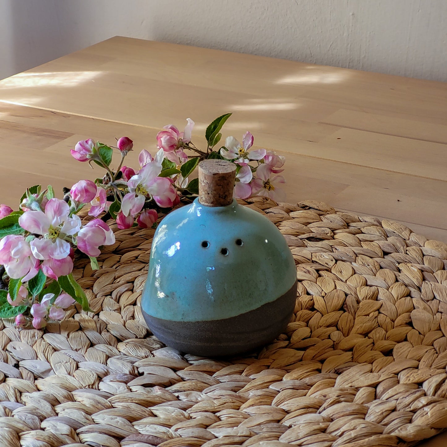 Delight your taste buds with this adventurous ceramic salt or pepper shaker. Handmade with pottery and painted in a daring grey with turquoise, this shaker is sure to make a statement in any kitchen. Express your bold side with this piece from Jogita Art Studio!