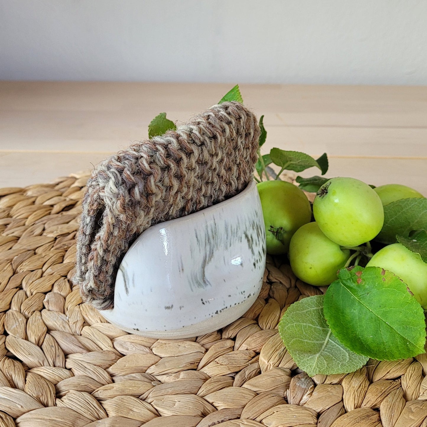 Decorative sponge holder for elegant sink display.