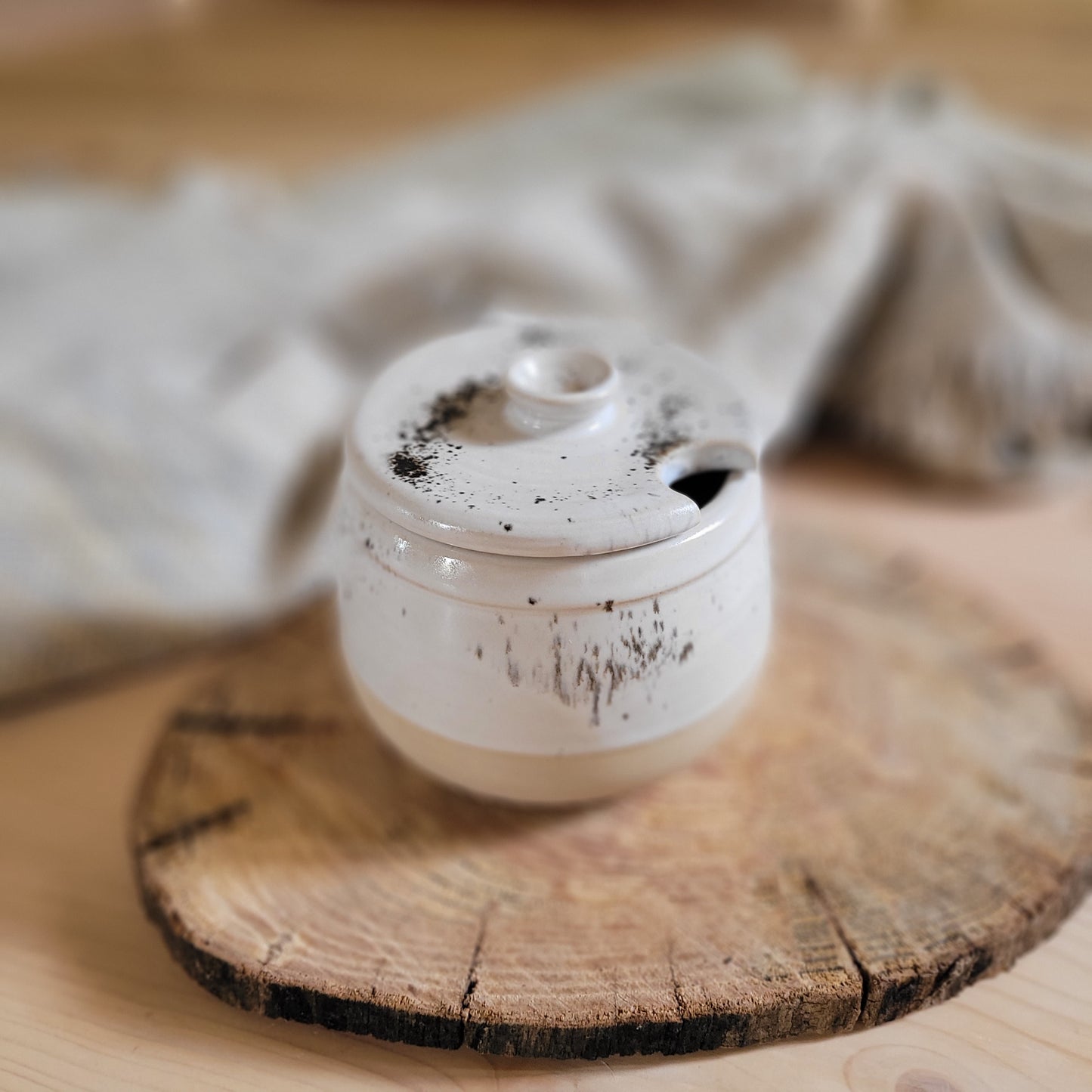 Handmade sugar jar, White stonaware with white speckled glaze.