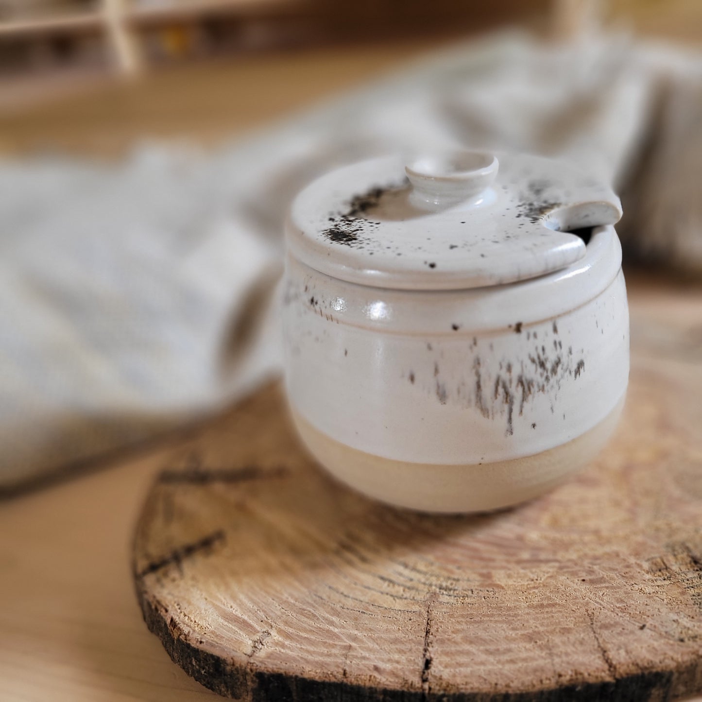 Handmade sugar jar, White stonaware with white speckled glaze.
