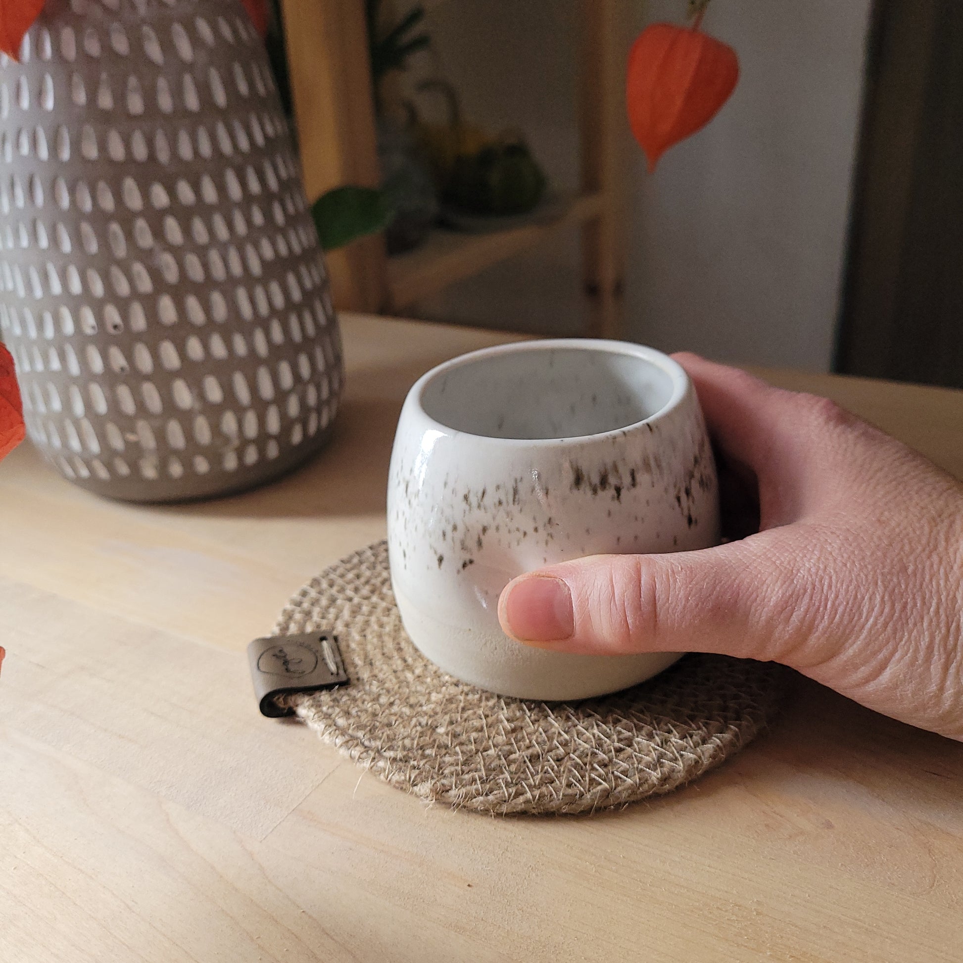 Savor the Beauty of Handmade Ceramics with This Handcrafted Double Espresso Cup and Rustic Jute Coaster