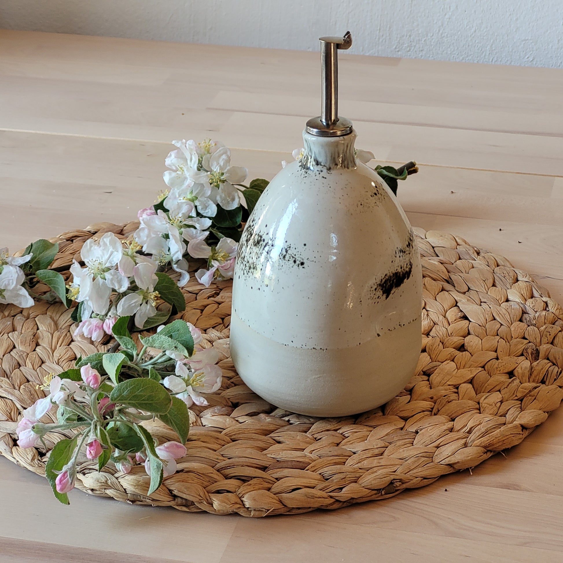 Multifunctional ceramic vinegar/oil bottle, also usable as a charming vase or homely ornament. Crafted with love and care in a small pottery studio in Latvia, ensuring each piece is one-of-a-kind.