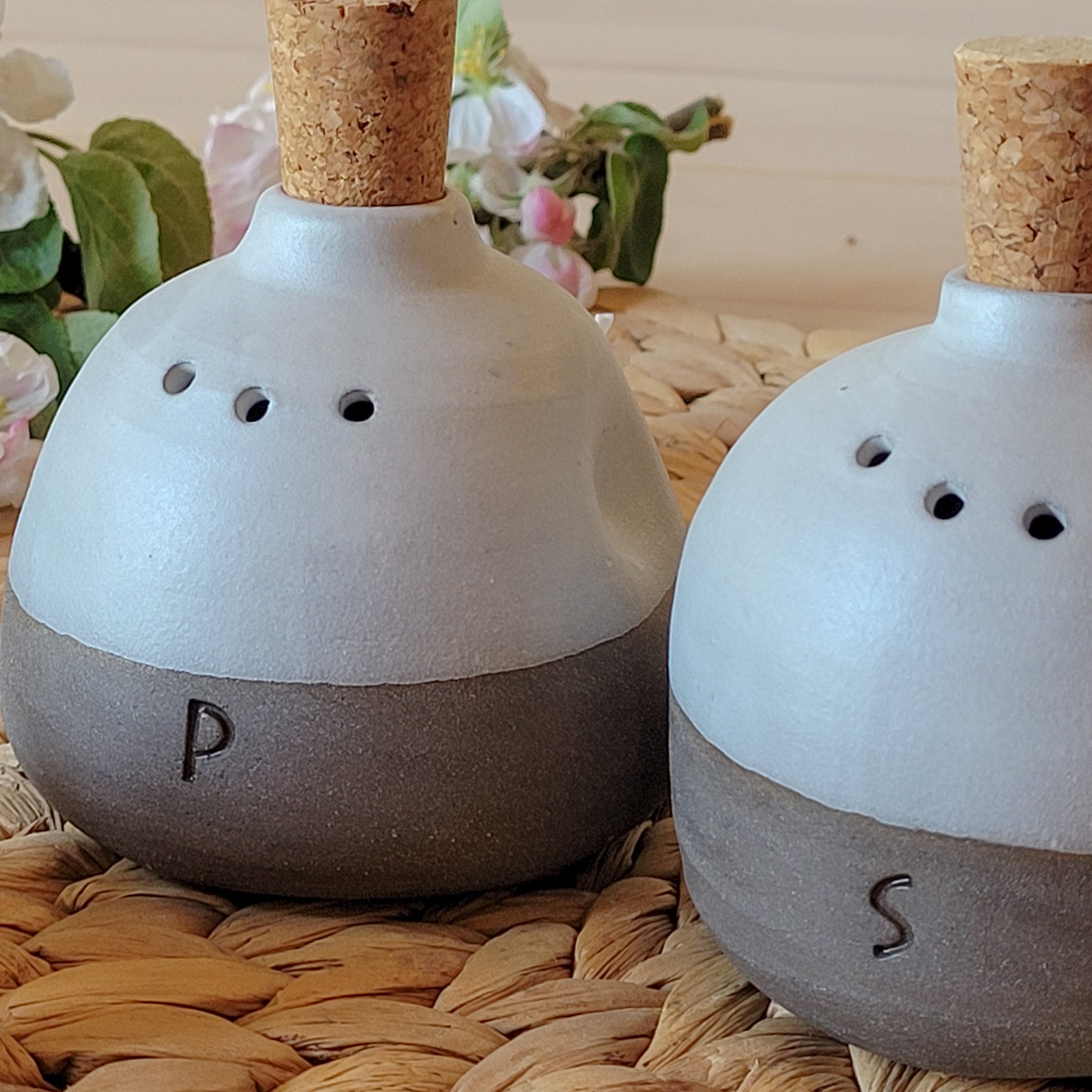Looking for a perfect housewarming gift? This set of two handcrafted pottery salt and pepper shakers is handmade and unique.
