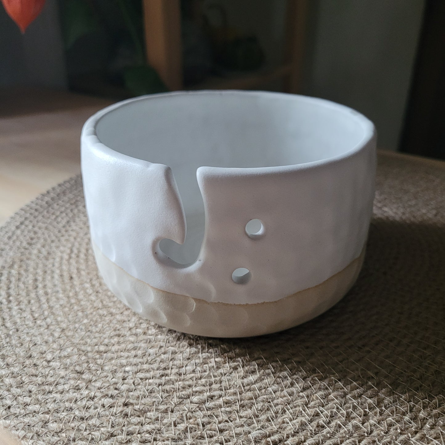 White Yarn bowl with glaze imperfection.