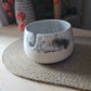 White speckled yarn bowl with imperfections