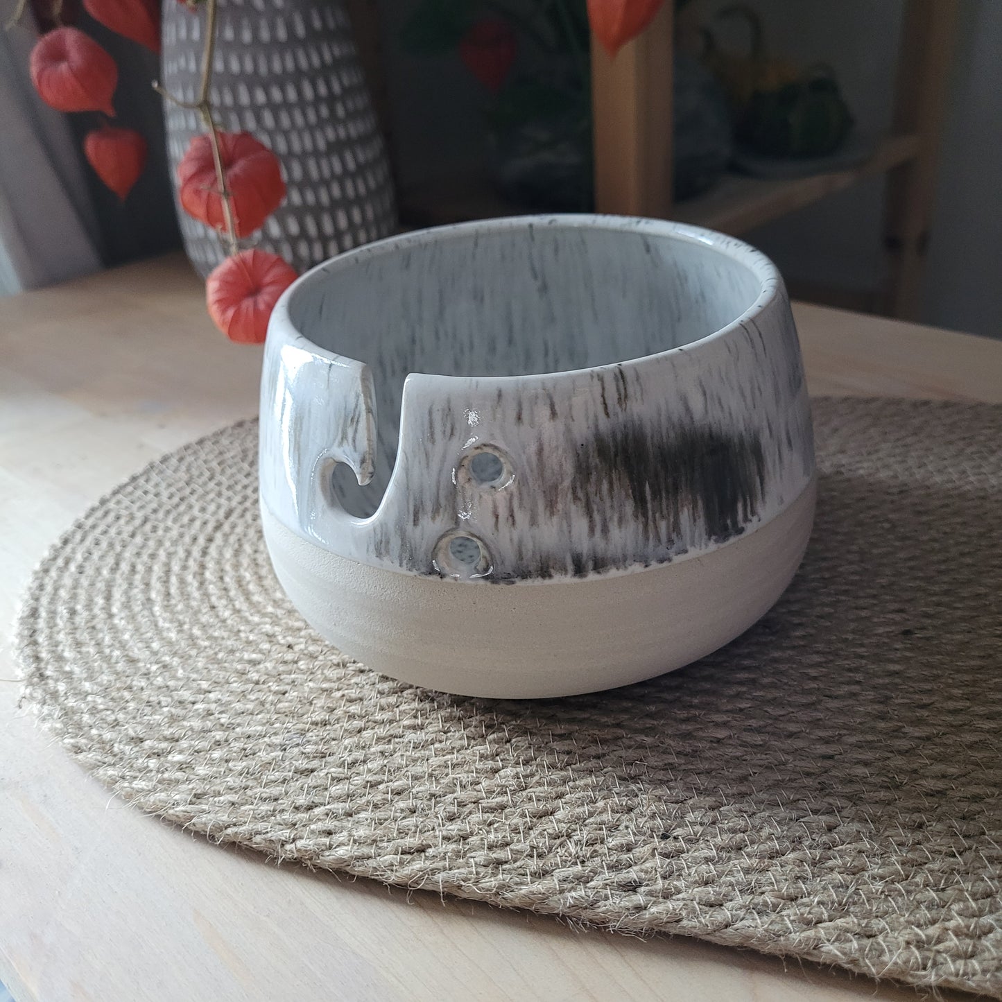 White speckled yarn bowl with imperfections