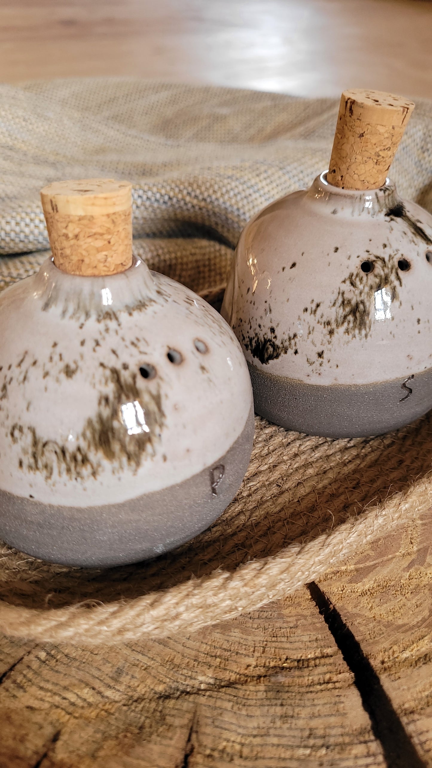 Ceramic Salt and Pepper jars- Set of two jars and jute basket. Gray with beige speckled glaze.