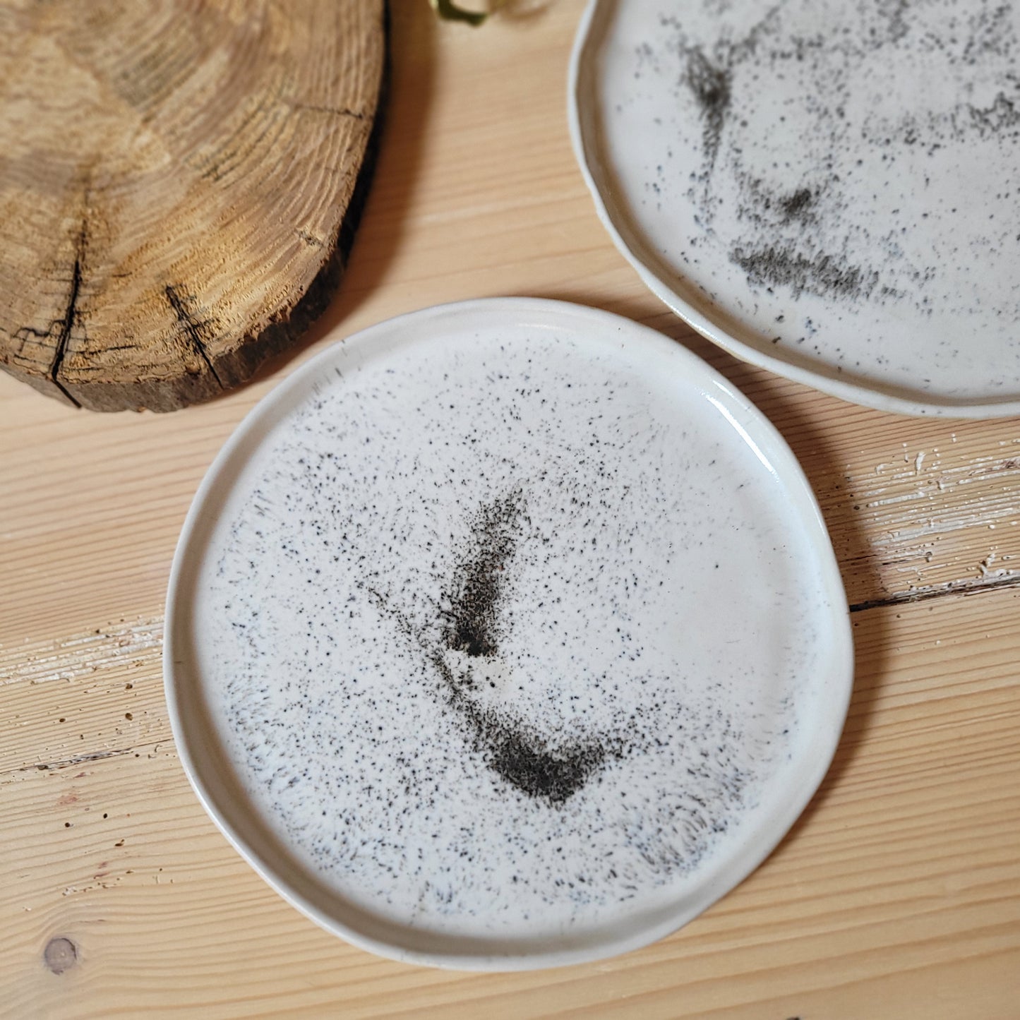 Speckled white dinner plate