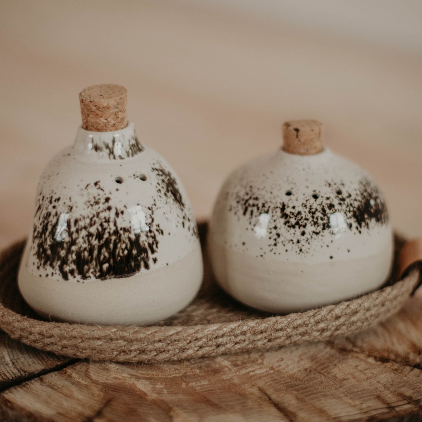 Perfect for any home décor, these handcrafted ceramic salt and pepper shakers are sure to add a touch of sophistication.