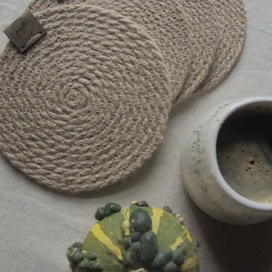 Embrace the natural beauty of jute fiber with these elegant coasters
