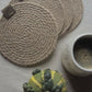 Embrace the natural beauty of jute fiber with these elegant coasters