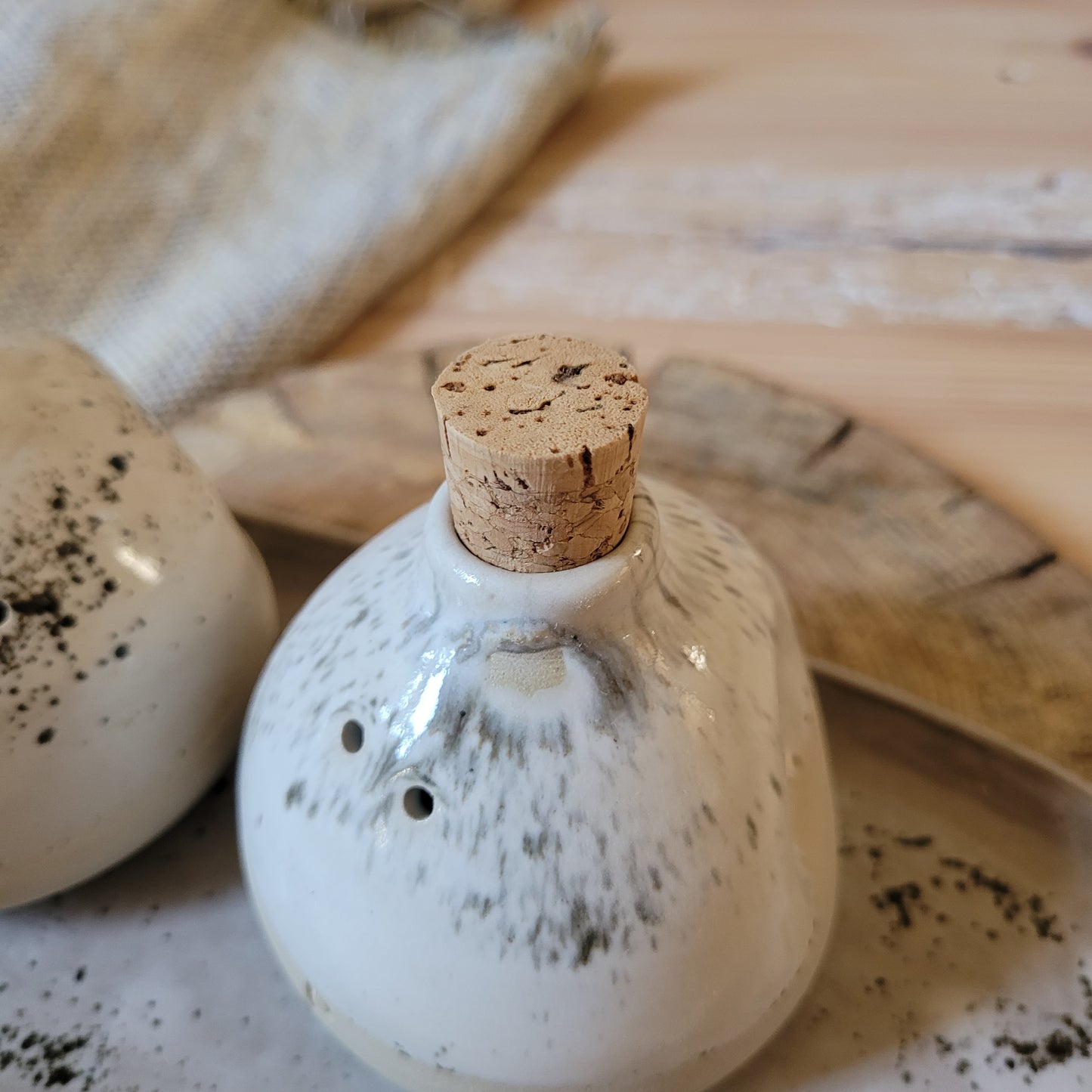 Imperfect salt and pepper set with serving plate