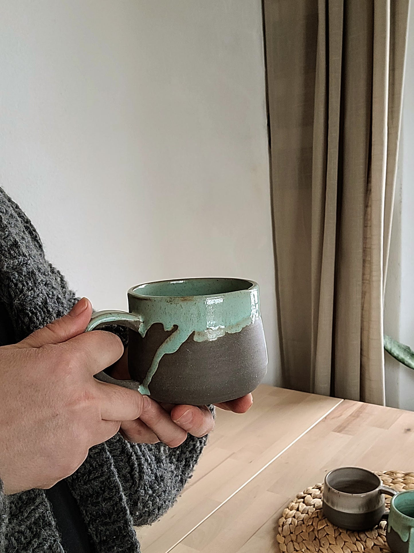 Looking for a great-looking mug to match your morning coffee? This ceramic mug is made in modern minimalist style with a unique rustic finish. The durable stoneware construction with a speckled glaze will handle both hot and cold liquids and special occasions alike.