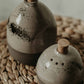 Uniquely crafted oil pourer made from stoneware pottery. Bring a new style to any kitchen with these handmade ceramic oil dispensers. Perfect for housewarming and hostess gifts.