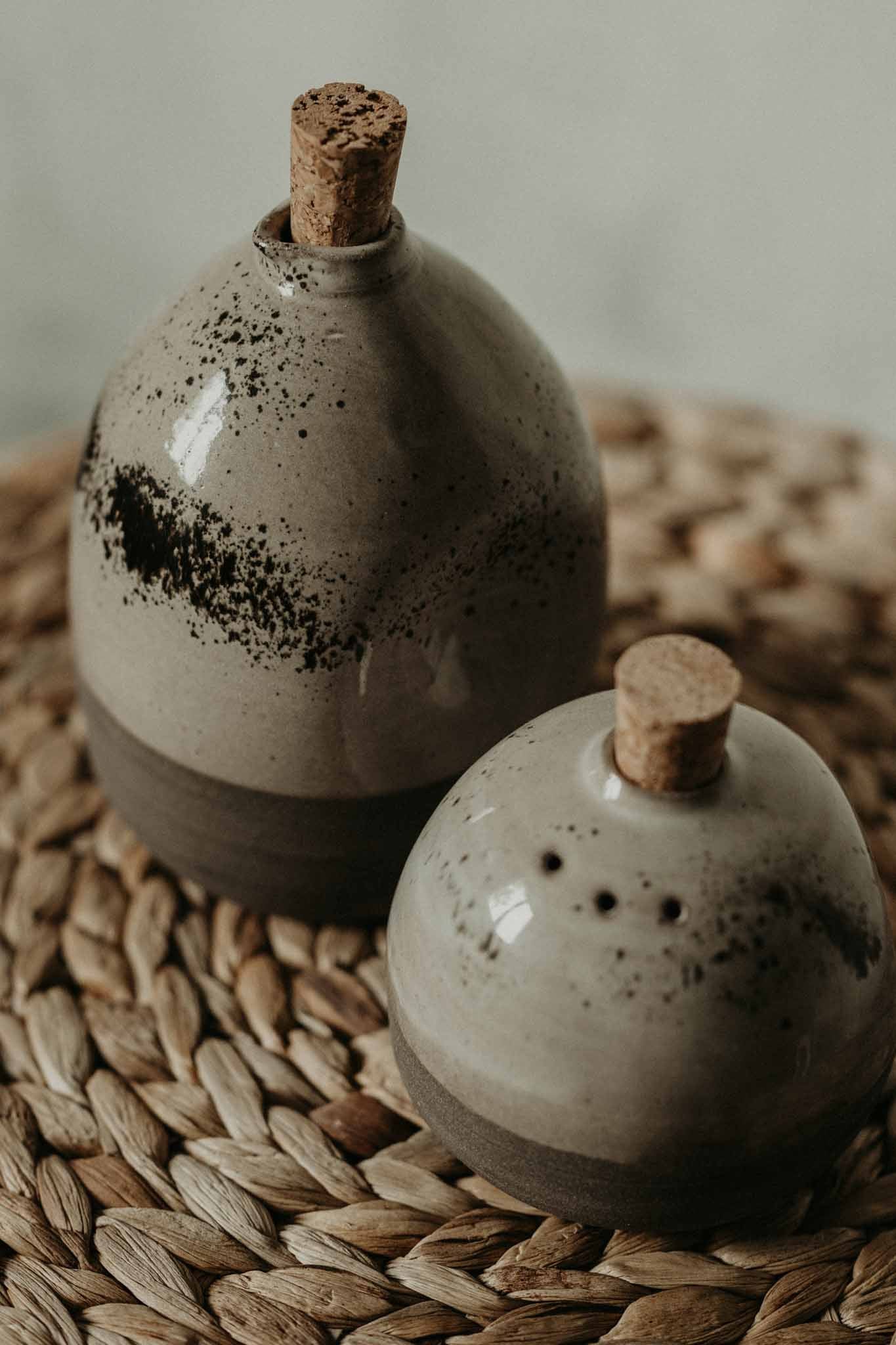 Uniquely crafted oil pourer made from stoneware pottery. Bring a new style to any kitchen with these handmade ceramic oil dispensers. Perfect for housewarming and hostess gifts.