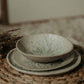 Dreiteiliges Geschirrset aus cremiger Keramik